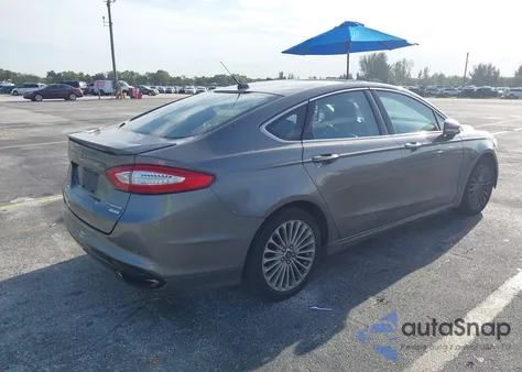 2014 Ford Fusion Titanium z USA, uszkodzony, nr VIN 3FA6P0K9XER271274